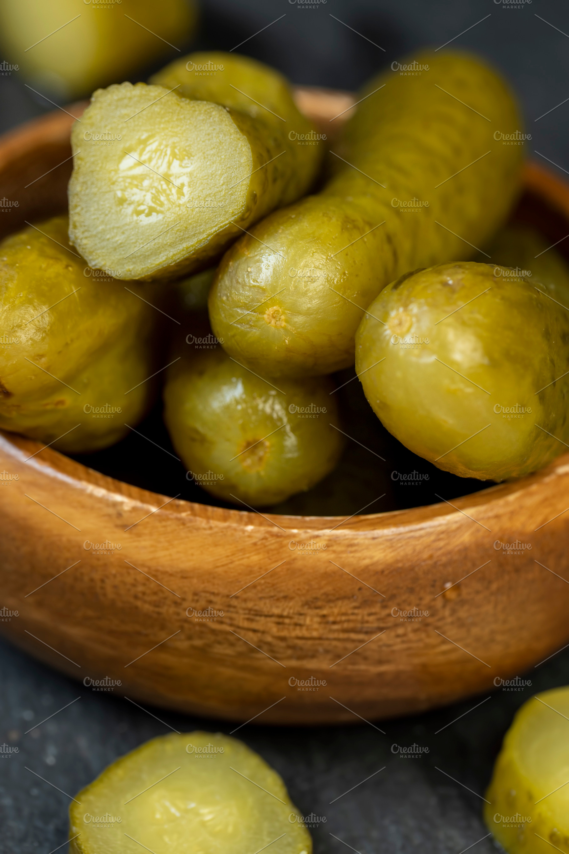 small, crispy green cucumbers salted with spices, a Photo by rsoollAI