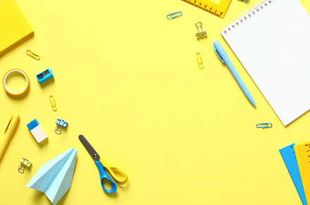 Flat lay school or office supplies on yellow background. Creative layout with s, a School & Education Photo by photoguns