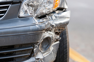 Damaged car bumper after accident, a Transportation Photo by AlyaAnd
