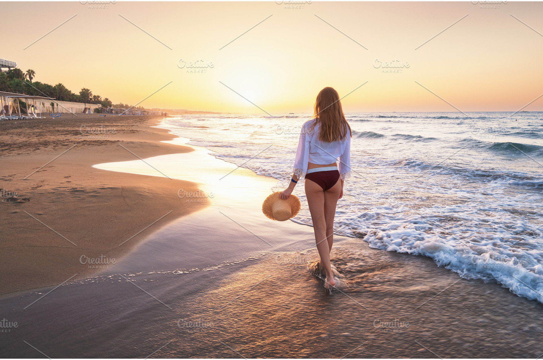 Beautiful young woman with straw hat, a Person Photo by den-belitsky
