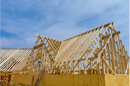 Construction of a wooden beam house, an Industrial Photo by Ungvar Studio