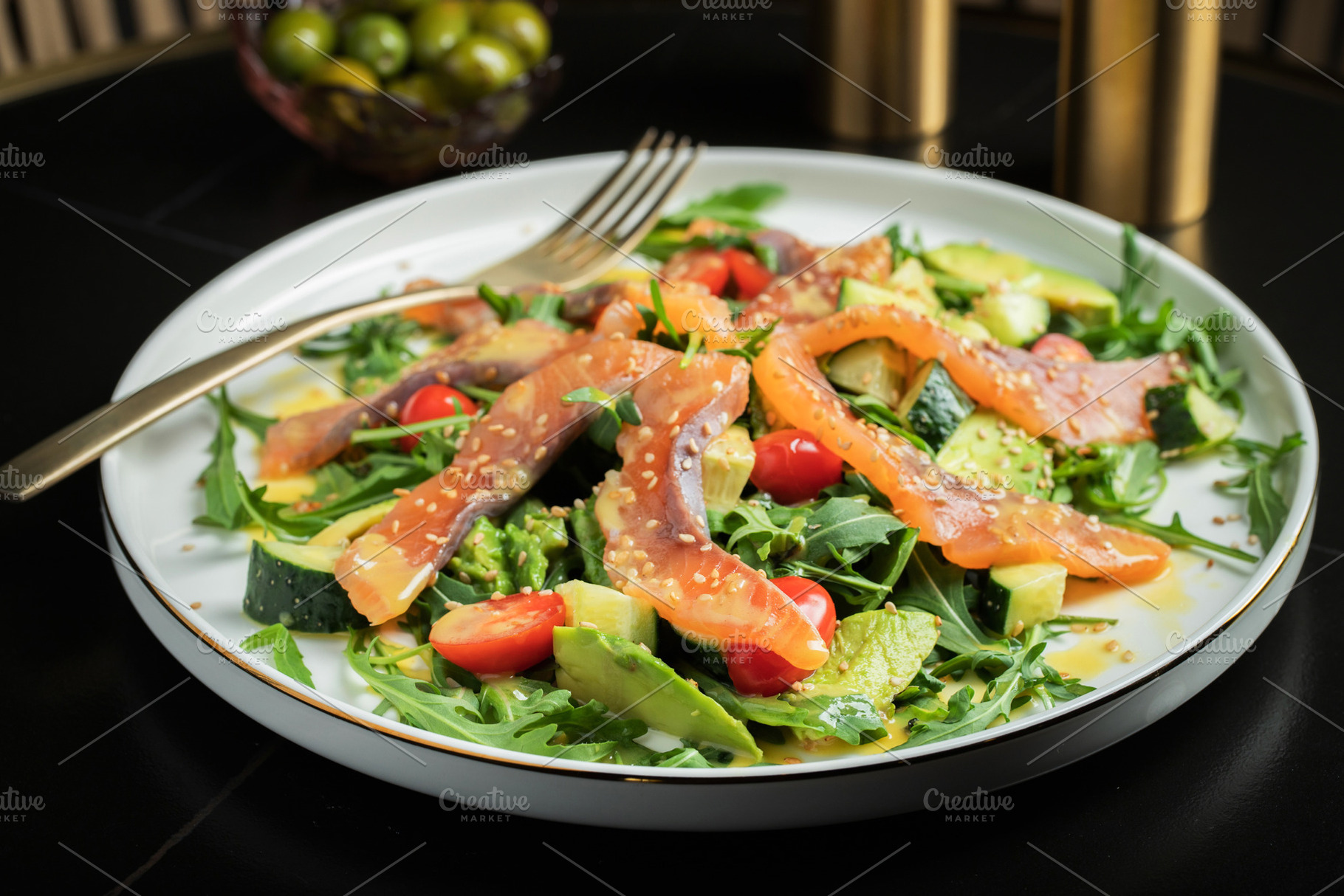 Salad with salted salmon and arugula, a Food & Drink Photo by Budarinphoto