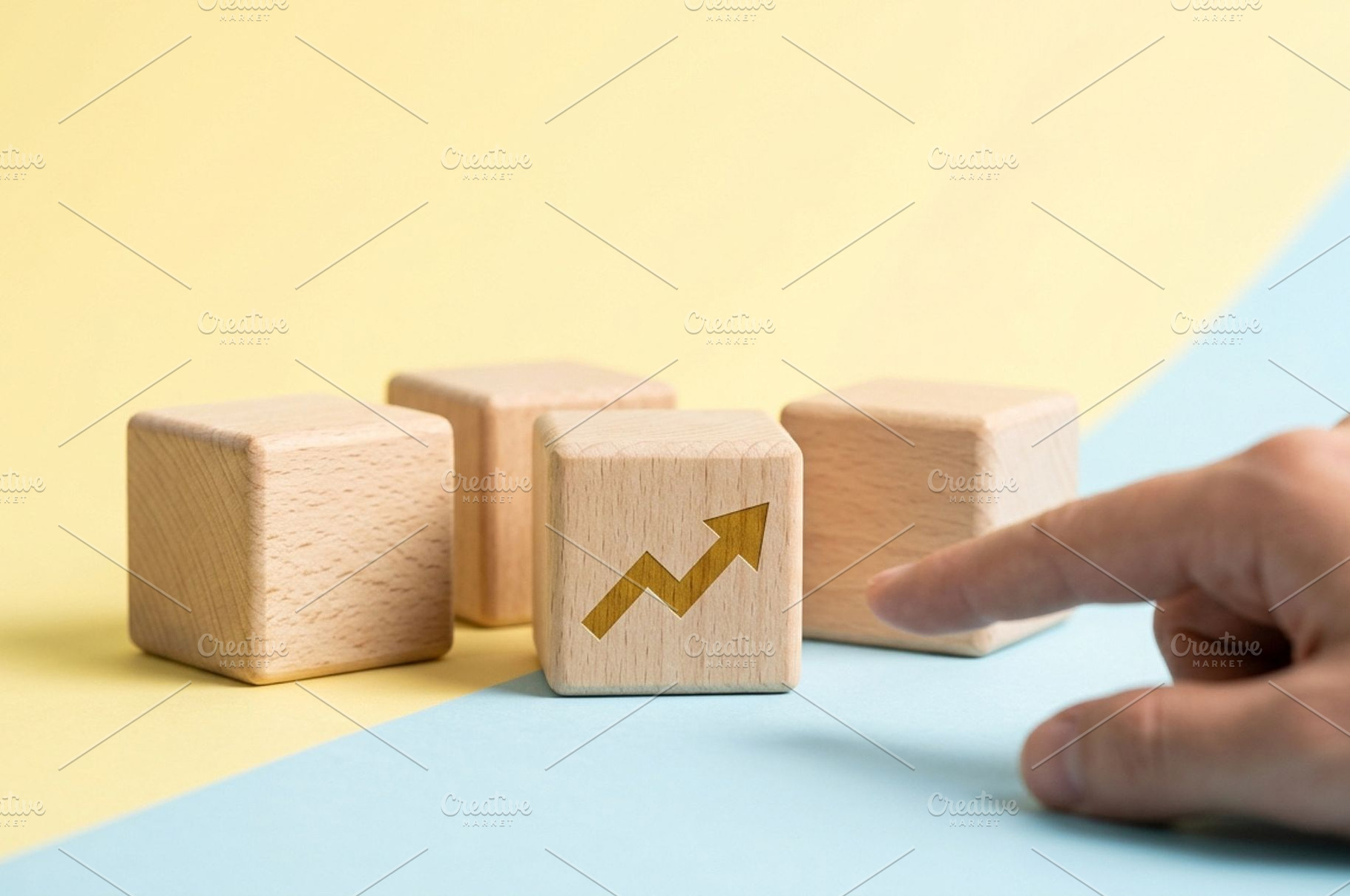 Wooden Block with Growth Arrow, a Business Photo by thepslr