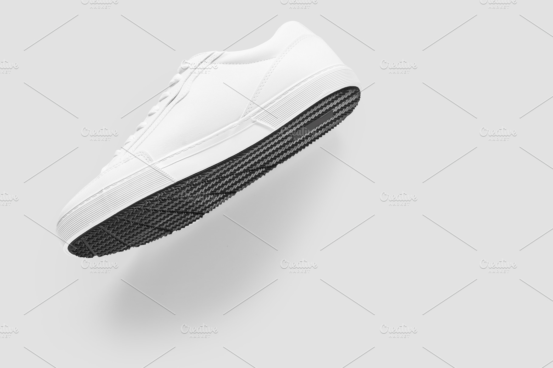 Mockup of a generic sneaker floating against plain background, a Beauty & Fashion Photo by rubenchase