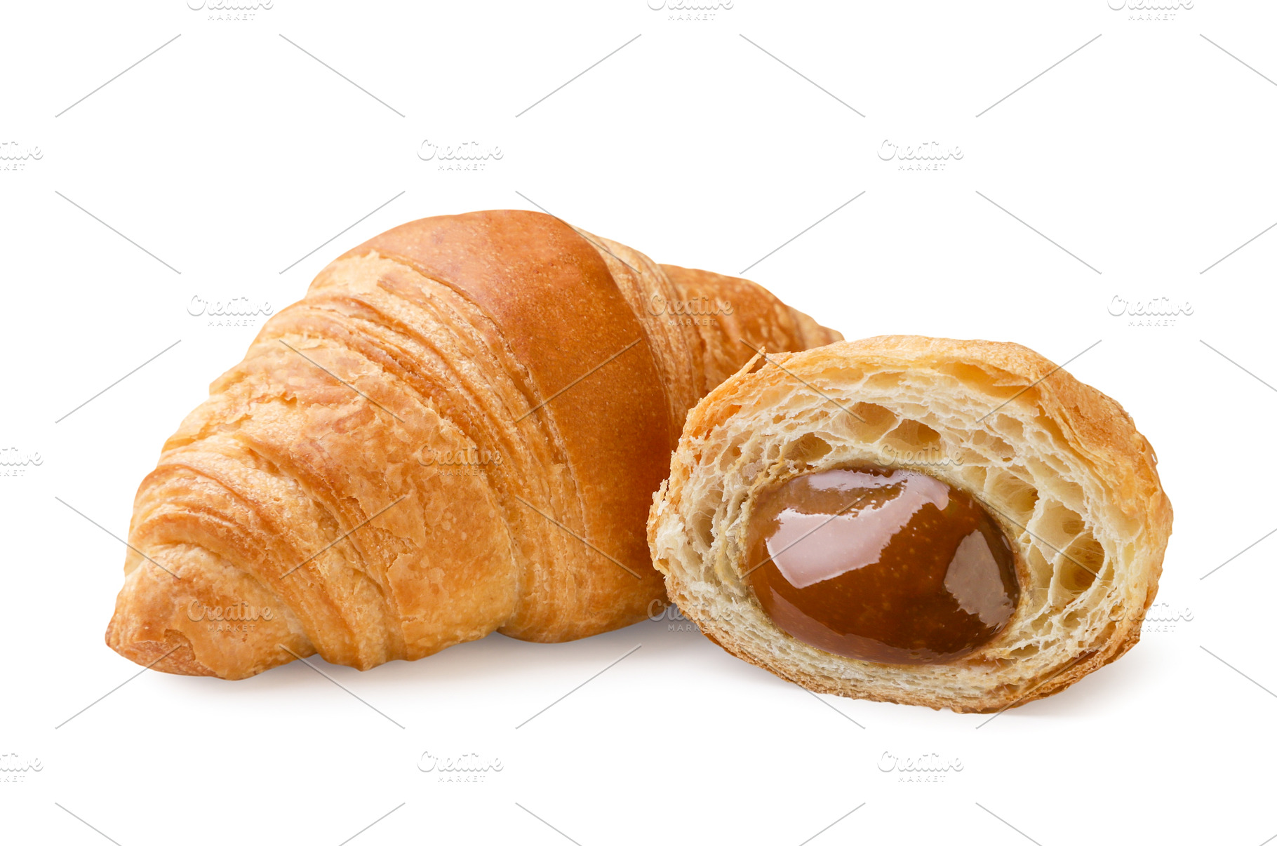 Croissant and half with jam on a, a Food & Drink Photo by innakreativ
