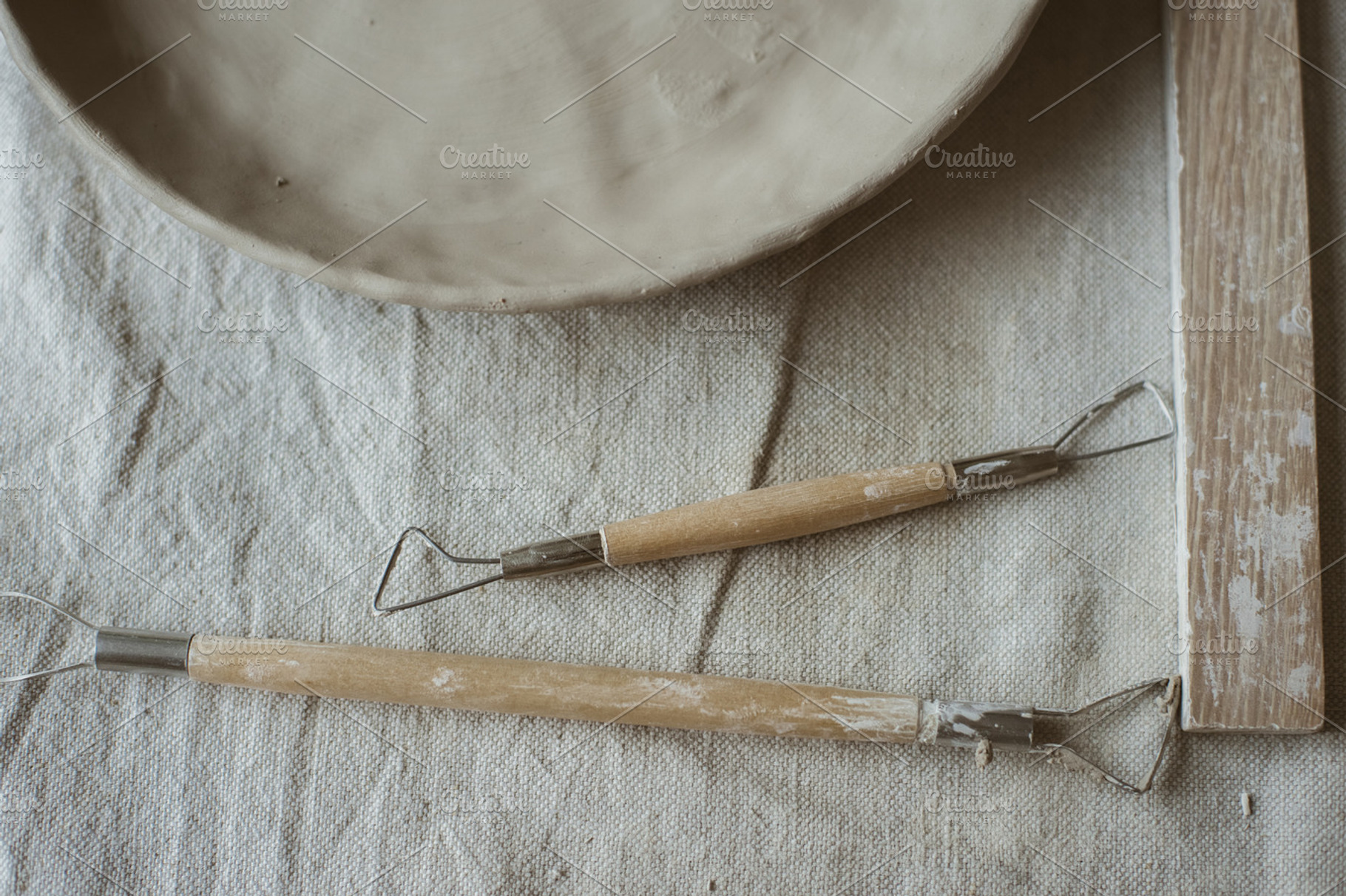 Ceramics in pottery workshop set featuring tools, pottery, and sculpting, an Arts & Entertainment Photo by Julia Brenner