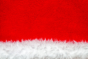 Christmas hat background. White and red texture.