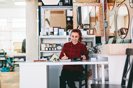 Woman shop assistant at work., a Person Photo by Photocreo Michal Bednarek