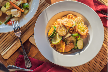 Pasta with fried vegetables and, a Food & Drink Photo by Elizaveta Galitskaya
