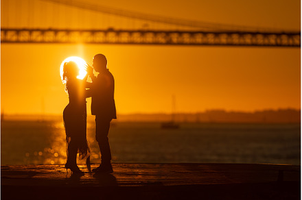Silhouetted couple sharing a moment, a Person Photo by Barcelona_dreams