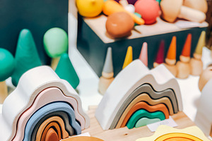 Colorful wooden rainbow toys, a Photo by Dvoevnore photos