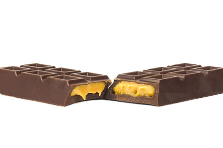 Chocolate bar isolated on white back, a Food & Drink Photo by AlexBush