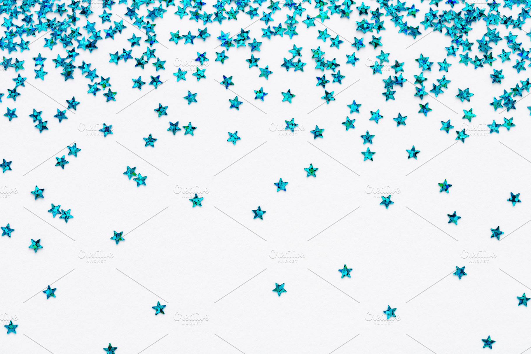 Blue falling stars glitter confetti, a Holiday Photo by Julia Manga