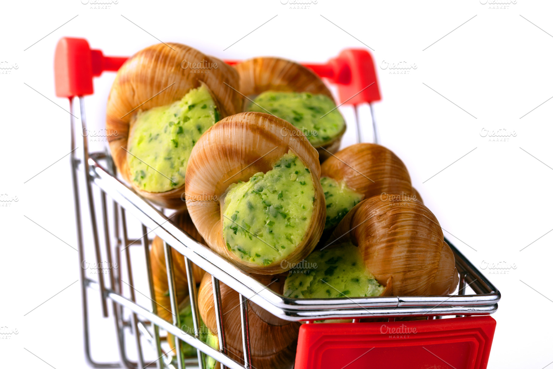 Gourmet escargot with herb butter displayed in a miniature red s, a Food & Drink Photo by Ales Munt