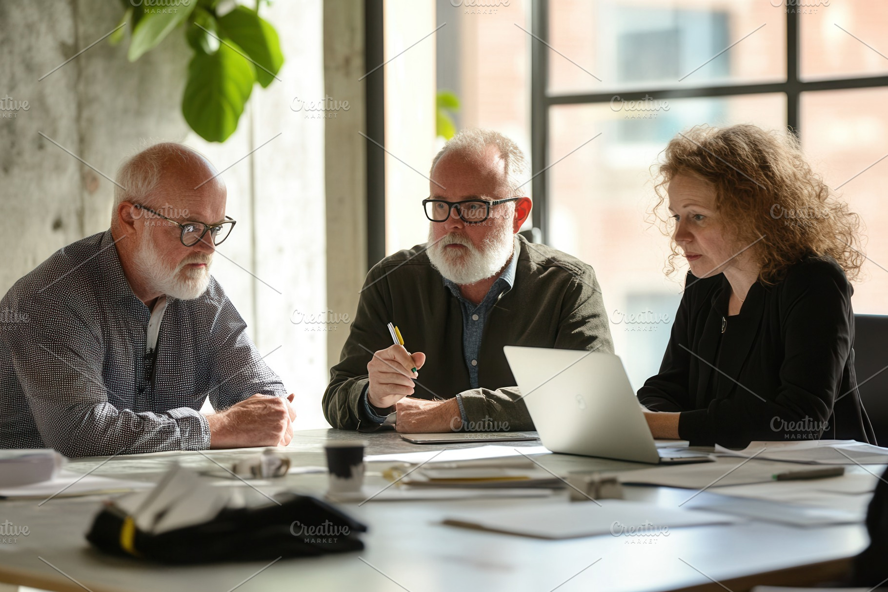 Three professionals debating, a Photo by Pavel_design