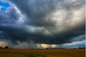 Dramatic storm clouds in the sky, a Nature Photo by Lukas Jonaitis SHOP
