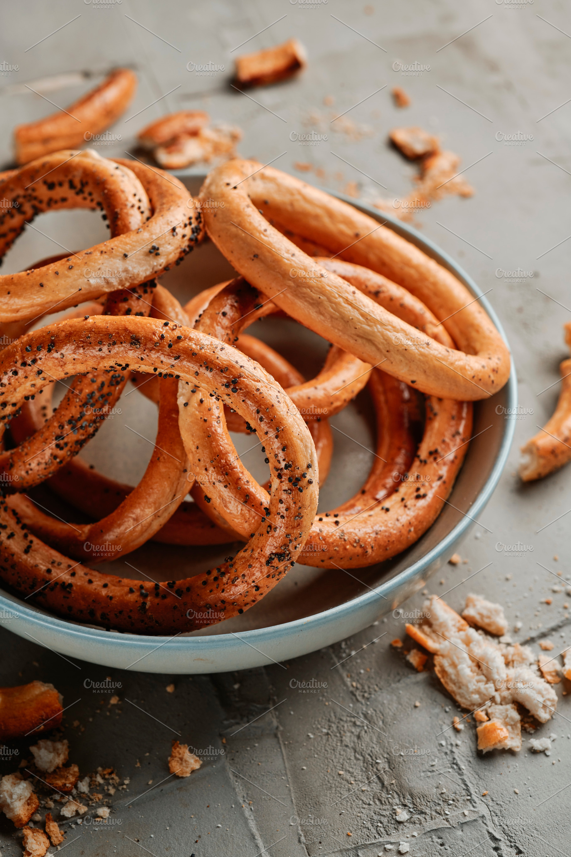 closeup of a plate with some romanian covrigi, a Photo by Nito