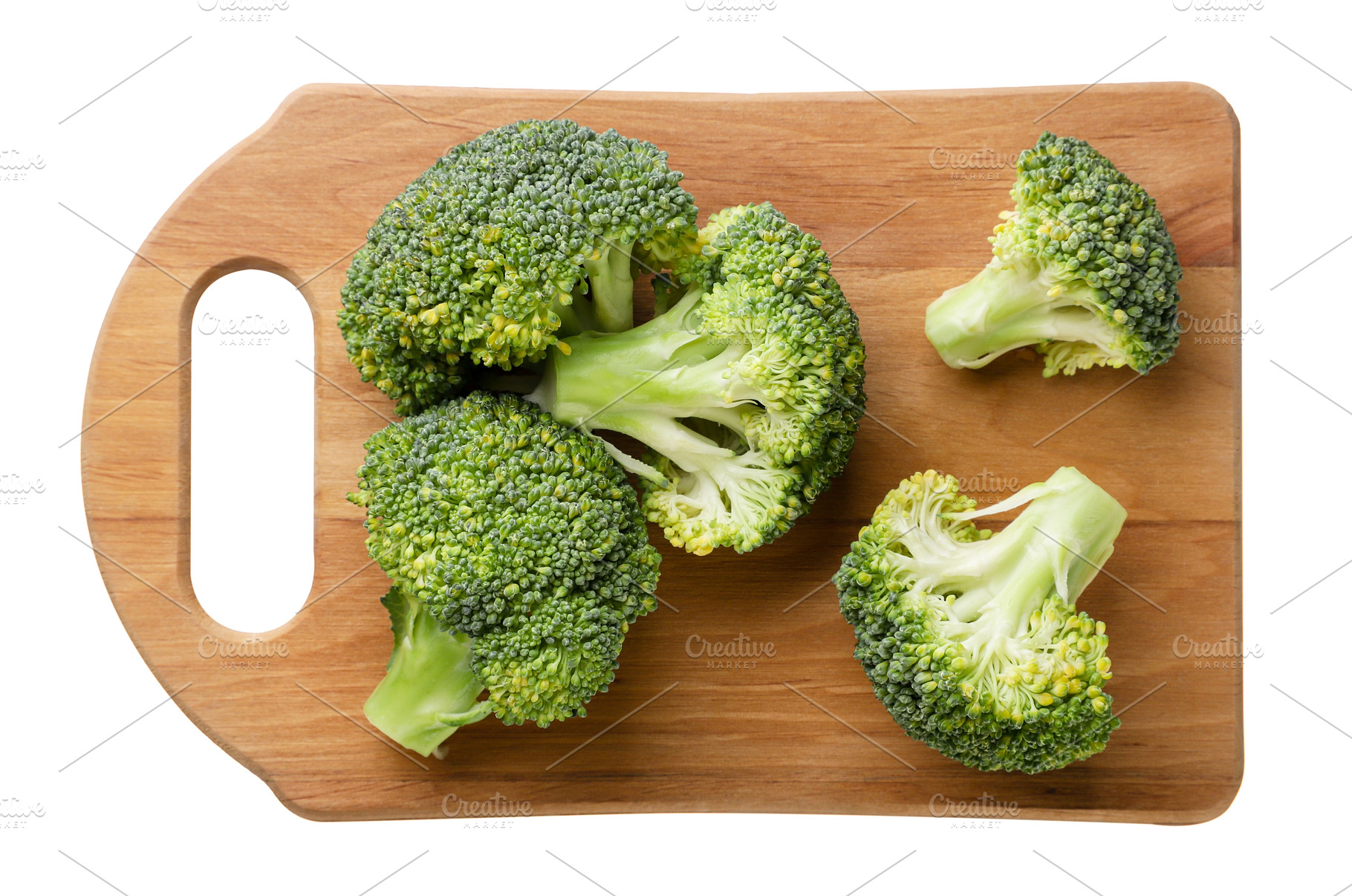 Broccoli on a kitchen board on a, a Food & Drink Photo by innakreativ