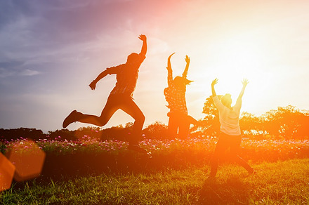Silhouette of happy people in sutset, a Person Photo by Guitarfoto Studio