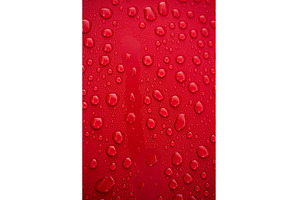 Bright red surface adorned with, an Arts & Entertainment Photo by IlliaBondarPhotography