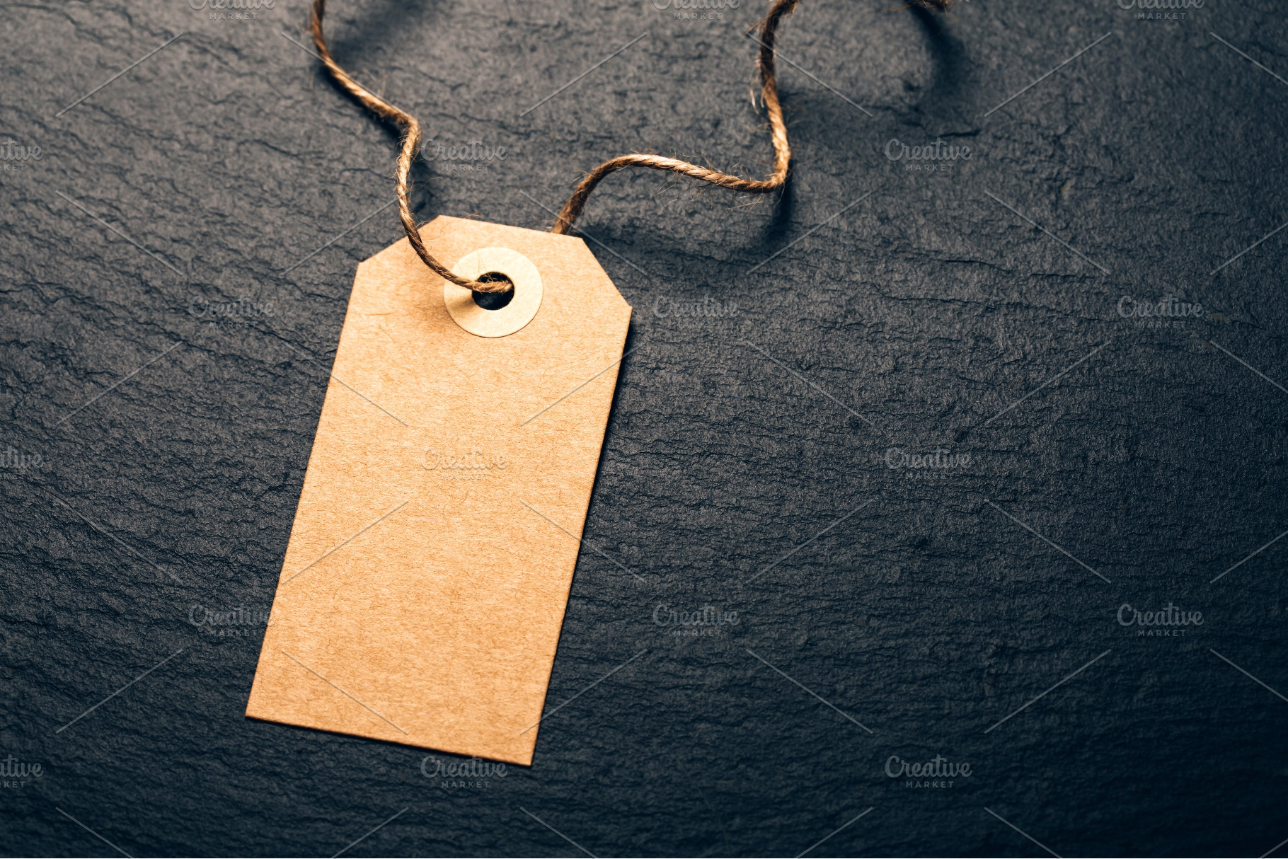 Blank kraft paper tag on twine, a Business Photo by Anna Efetova