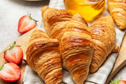 Delicious french croissants with fresh strawberries and honey fo, a Food & Drink Photo by Olena Rudo