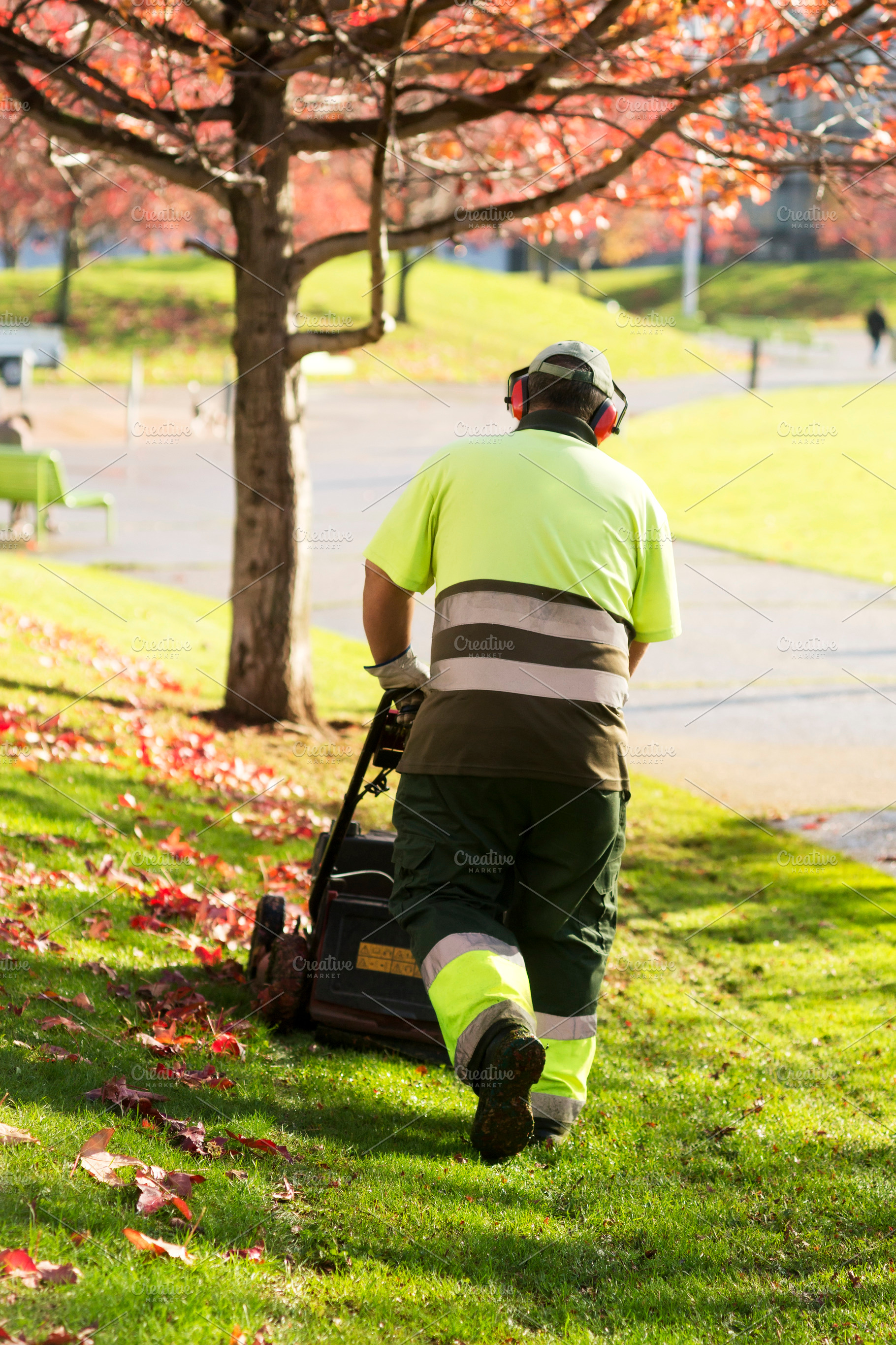 Lawn mower gardener stock photo containing grass and lawn, an Industrial Photo by Genaro Diaz photographs