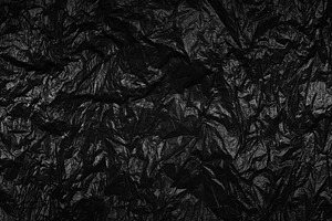 Black garbage bag texture background, a Background Photo by ArtBackground