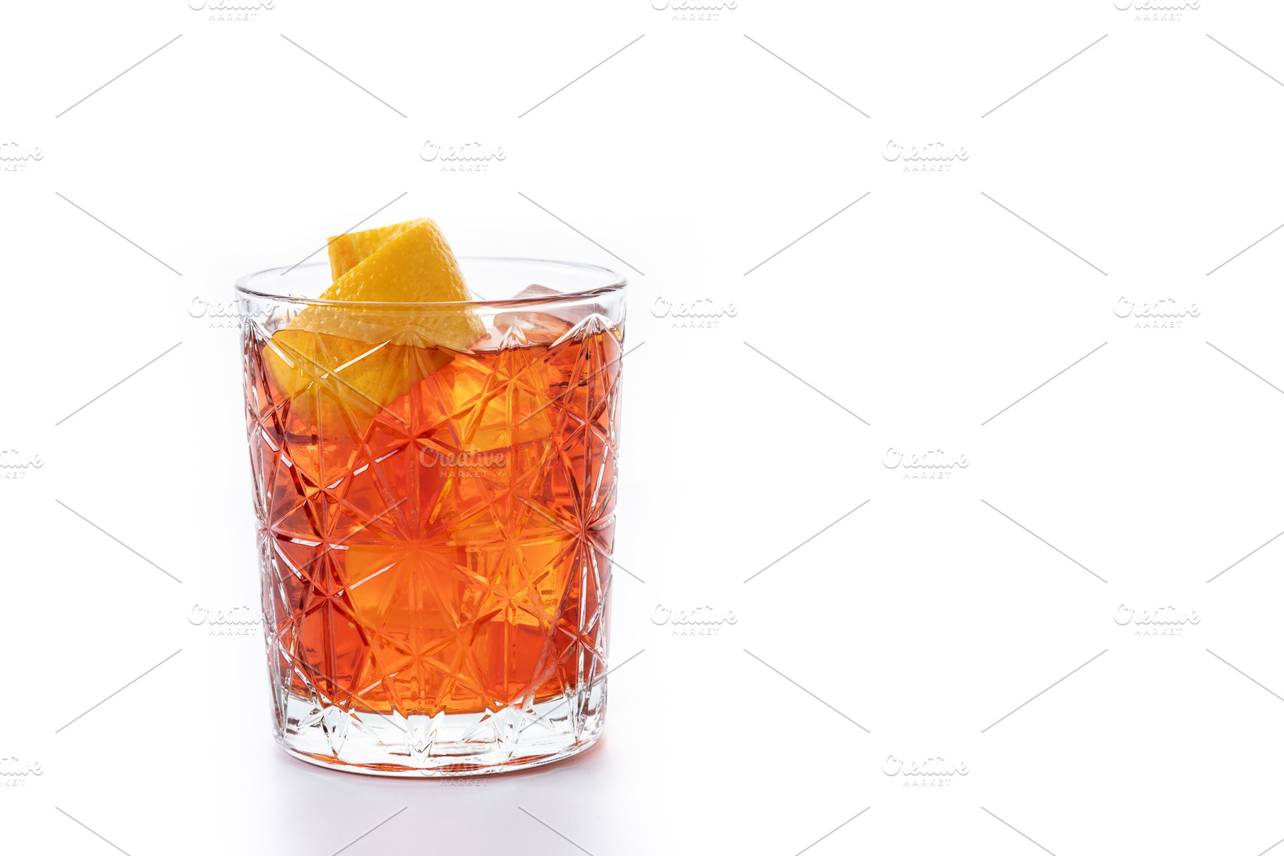 Americano cocktail garnished with twist orange isolted on white background, a Food & Drink Photo by etorres69