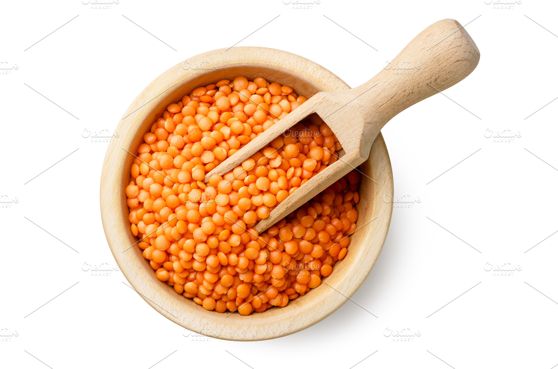 Red lentils in a wooden plate with a, a Food & Drink Photo by innakreativ