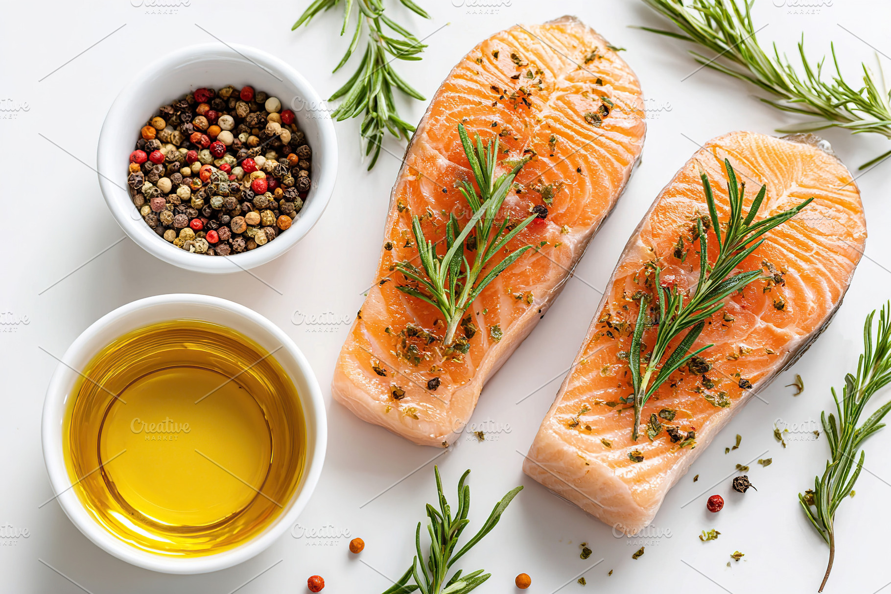 Fresh salmon steaks garnished with herbs and spices ready for cooking or grilli, a Food & Drink Photo by AlyaAnd