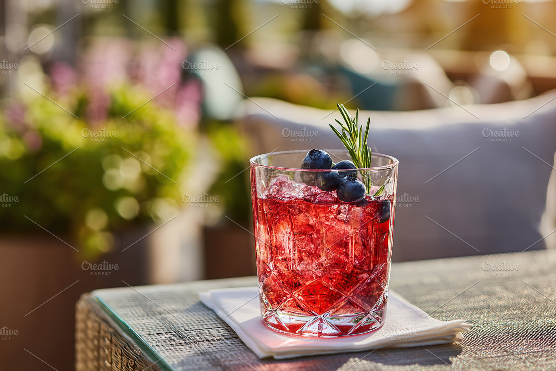 Refreshing cocktail with blueberries and rosemary, a Food & Drink Photo by AlyaAnd