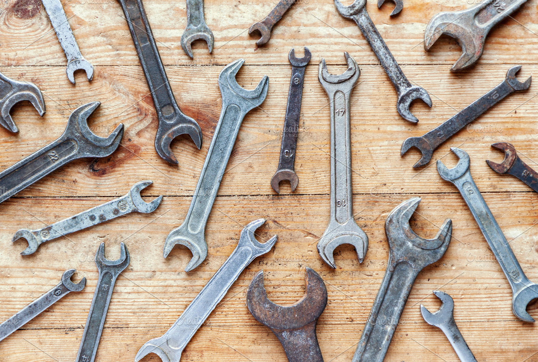 Old rusty grunge wrenches flat lay, an Industrial Photo by BOOCYS