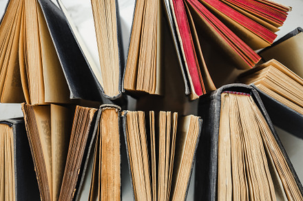 Stack of vintage books lying on the table, a School & Education Photo by Svetlana Barchan