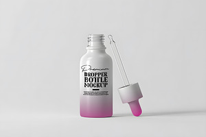 Premium Dropper Bottle Mockup, a Packaging Mockup by GenesisCreativeCo