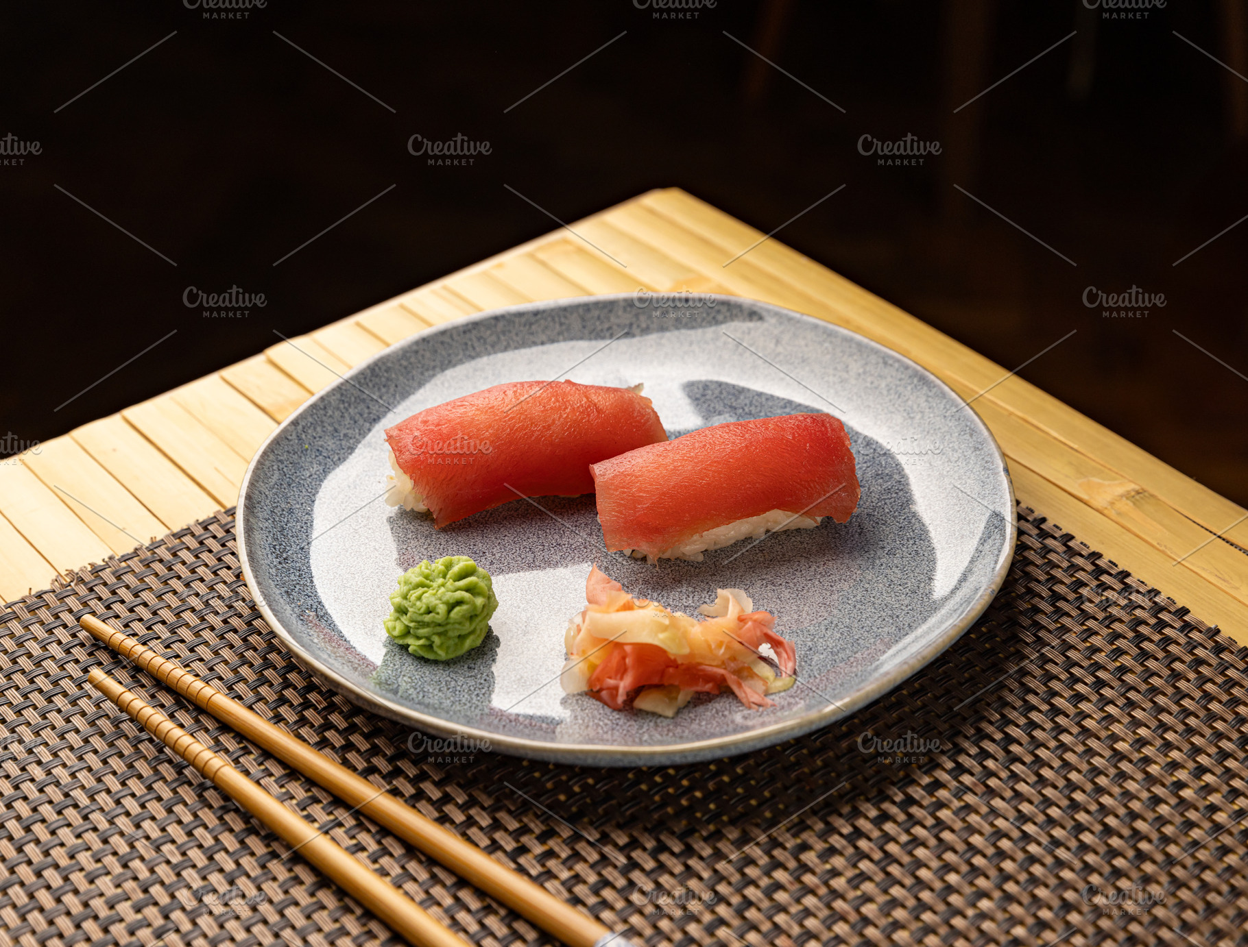 Two maguro nigiri sushi, a Photo by Grafvision photography