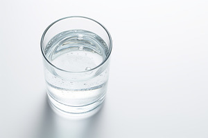 Glass of water isolated on white background, a Food & Drink Photo by AlyaAnd