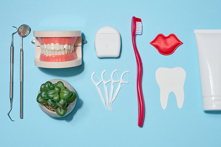 Set of oral hygiene products and tools, tube of toothpaste, toot