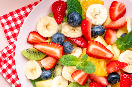 Summer fruit and berry salad with fresh strawberries, blueberrie, a Photo by 5PH