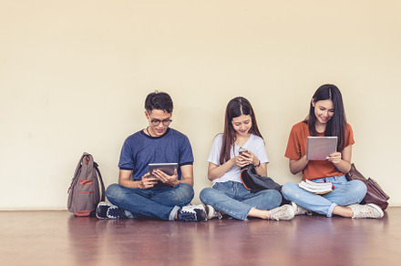Group of Asian college student using tablet and mobile phone out, a School & Education Photo by Ministocker