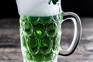 Green beer mug with foam for St. Patrick’s Day, a Food & Drink Photo by etorres69