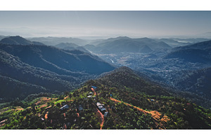 Aerial view of mountains covered by, a Nature Photo by Goinyk