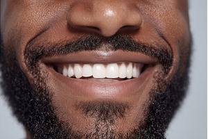 A close-up image of a young man with, a Person Photo by ZinetroN