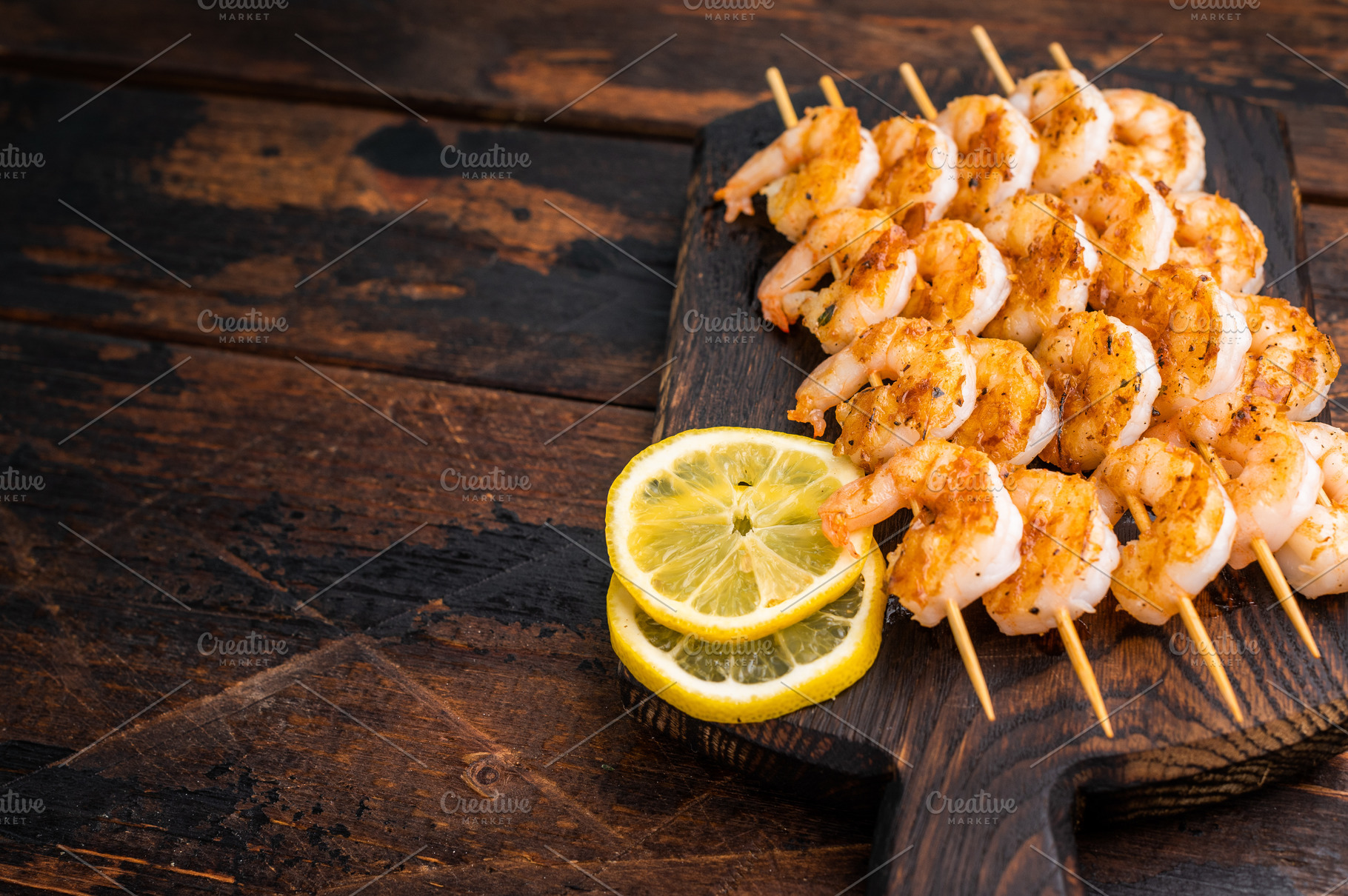 Gourmet seafood appetizer: spiced prawn shrimp kebabs served on, a Food & Drink Photo by composter-box@mail.ru