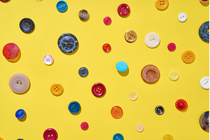 Colorful sewing buttons on bright
