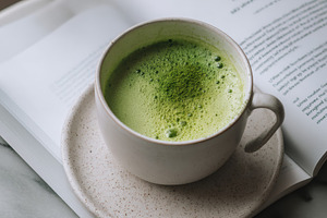 White ceramic cup with matcha, a Food & Drink Photo by Virgo Studio