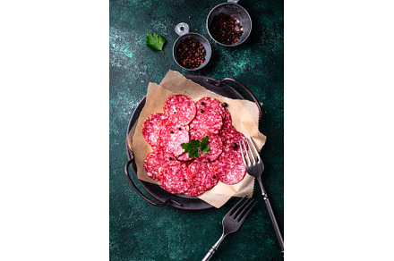 Sliced spicy tasty salami sausage