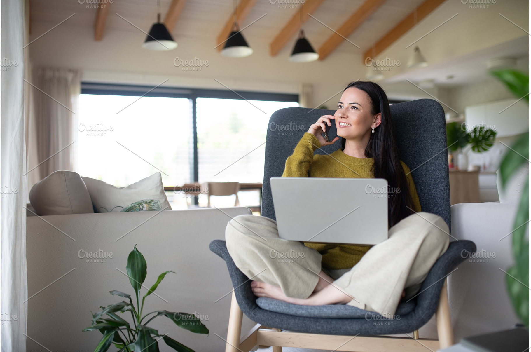 Female freelancer working from home, a Person Photo by HalfPoint