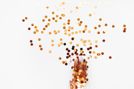 Wine glass with golden spangles featuring christmas, new year, and xmas