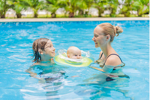 Mother with her older son and baby, a Sports & Recreation Photo by Elizaveta Galitskaya
